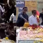 Vijay campaigning on a bicycle