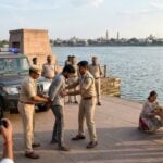 bhopal man arrested for throwing dog into lake viral video news