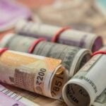 RBI boosted the rupee by selling dollars