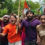 throw their medals into Ganges